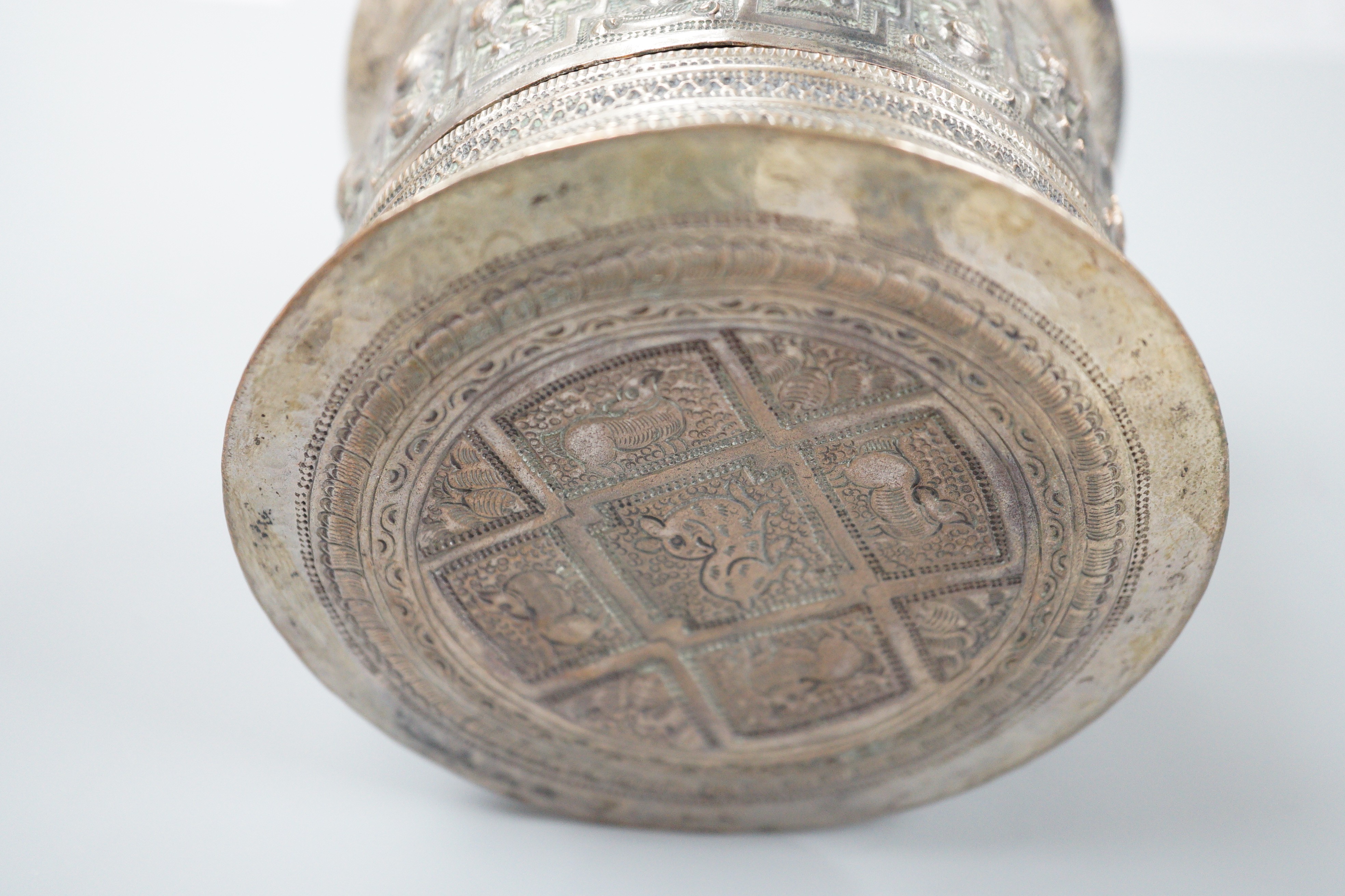 A 19th century Shan people white metal circular betel box and cover, Eastern Burma, height 10.5cm, 266 grams.